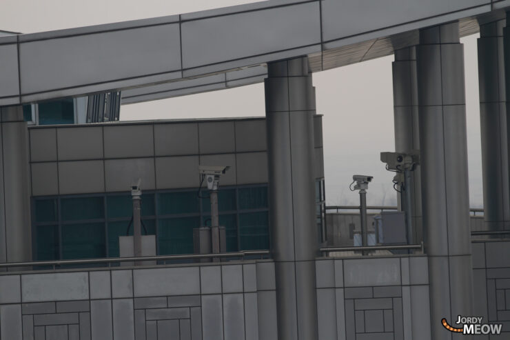 Modern surveillance building in North Korea, reflecting authoritarian control and restricted access to visitors.
