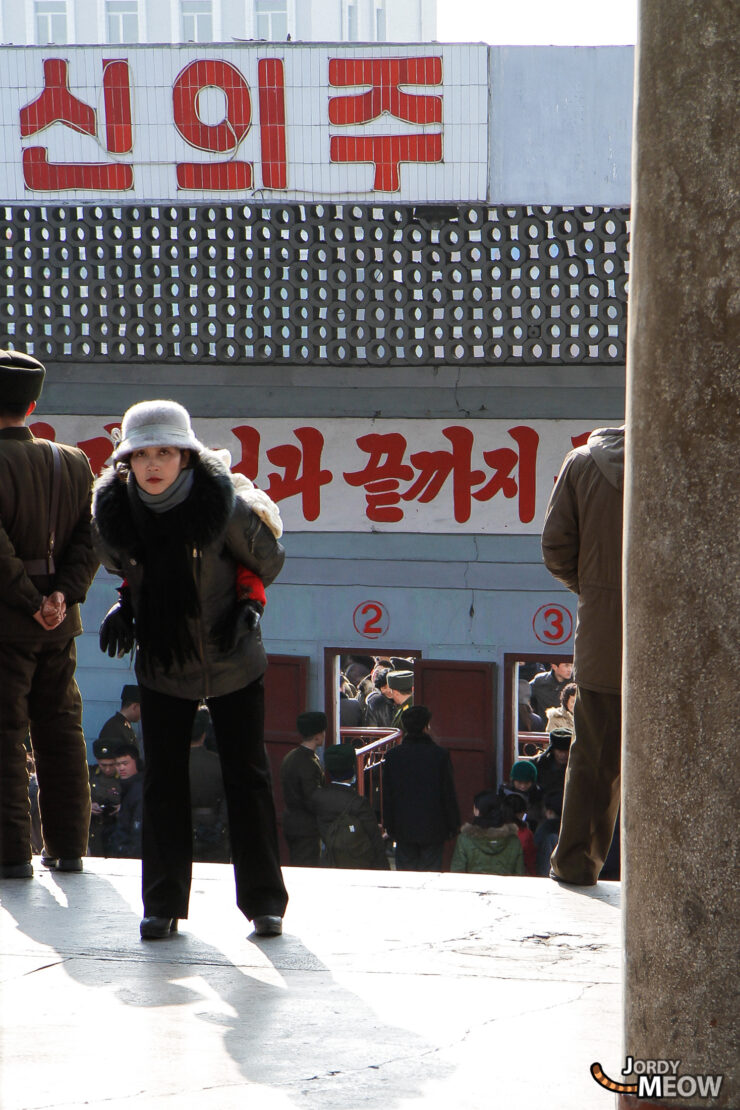 Exploring urban life in North Korea, showcasing bustling street scene in Pyongyang.