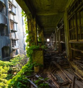 Exploring Gunkanjima: Abandoned City in Nagasaki - urban decay and haunting atmosphere.