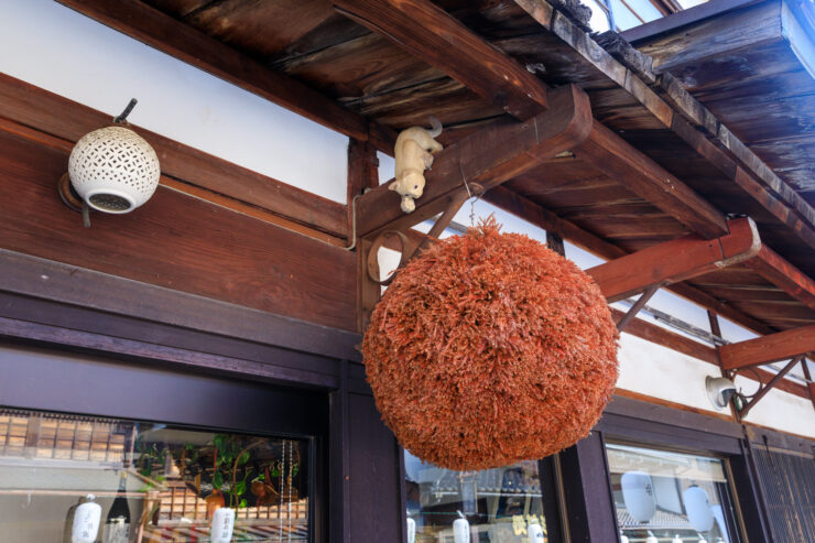 Explore traditional Japanese street decor in Inami Yokamachi with a captivating hanging ornament.