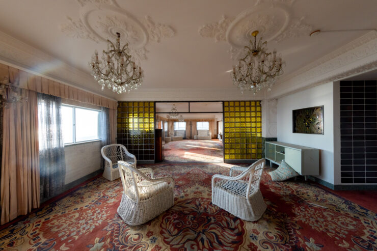Abandoned opulent hotel lobby, haunting elegance