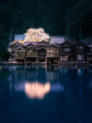 Traditional Japanese boathouse village reflection by night