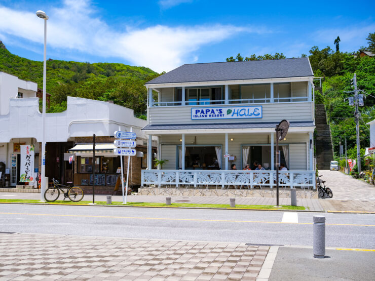 Quaint coastal cafe, scenic outdoor seating.