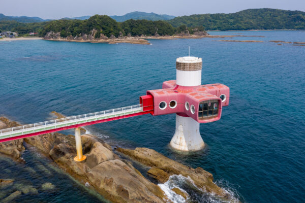 Vibrant Ashizuri Red Lighthouse on Rugged Coast