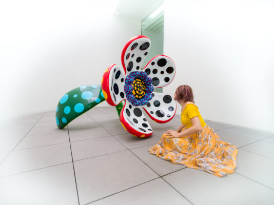 Colorful Yayoi Kusama sculptures immersive art installation